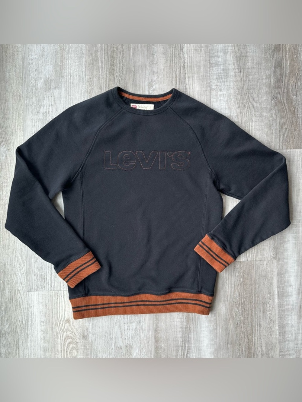 Levi's Men's Black Crewneck Sweatshirt with Rust Trim